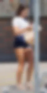 Hot brunette with a great ass in tight denim shorts