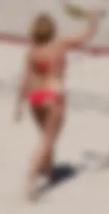 Redhead with nice ass and back dimples in red bikini on the beach