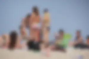 Two thick white girls in bikinis on the beach with big asses