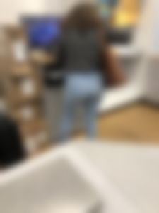 1st Post: Curly Hair Ass in jeans using the computer