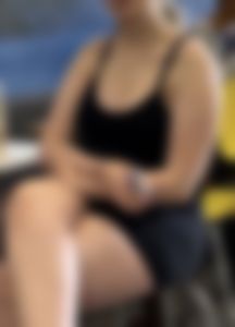 Thick ass in black bodysuit