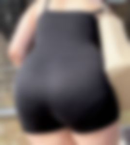 Thick ass in black bodysuit