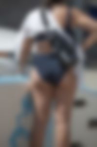 Great ass on bikini bottomed surfer girl
