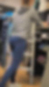 Store worker in jeans