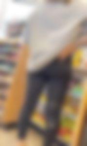 Leg brace girl shows round butt