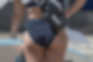 Great ass on bikini bottomed surfer girl