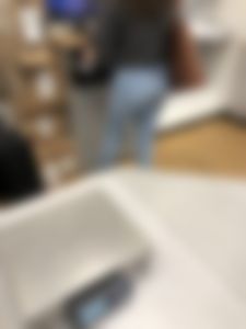 1st Post: Curly Hair Ass in jeans using the computer