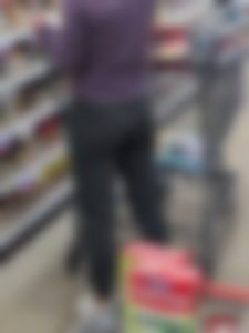 Milf with slight wedgie showing
