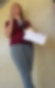 College student in grey leggings almost with camel toe showing