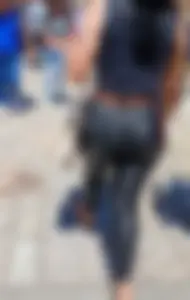 Item #218335 – Mexican MILF in leather pants with big round ass showing