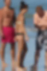 Beach girl out in a bikini with a nice round big booty