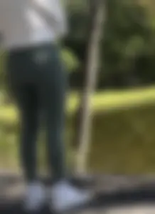Cute girl in green leggings
