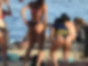 Fit girl with nice body in thong bikini on the beach