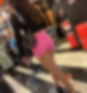 Latina with super tight pink shorts