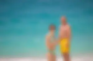 Assortment of sexy babes at the beach in bikinis
