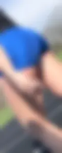 College Track Girl in Blue Nike Pros