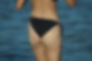 Sexy Booty in Black Swimsuit Beach Creepshot Closeups Gallery