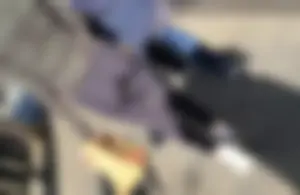 Skinny ethnic teen in shiny leggings with a cute ass and nice gap