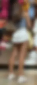 Gorgeous legs creepshot, girl wearing a skirt at the store