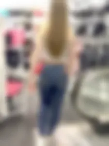 Cute Skinny Girl in Tight Jeans and a Top - Candid Photos at the Store