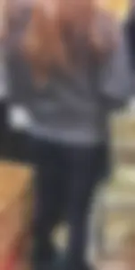 Fit shopping brunette girl in leggings and a hoodie with a nice ass
