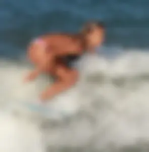 Hot surfer chicks out in the water