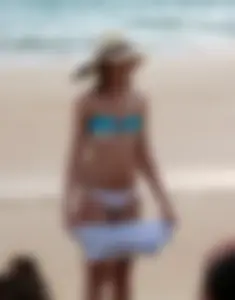 Cute beach girl with decent body in bikini