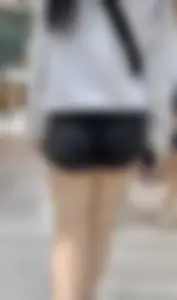 Asian girl in tight black shorts at the mall