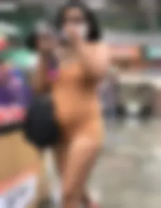 Latina with hard nipples and a big booty in tight spandex shorts outfit
