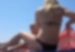 Two sexy blondes laying out in bikinis with nice bodies