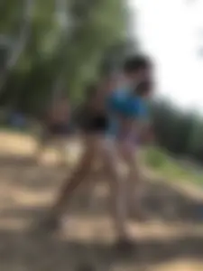 Wet Girls in Swimsuits Walking Towards Water at a Lake Beach Photo Series