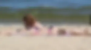 Two sexy beach teens in bikinis, one thick and one skinny with big boobs