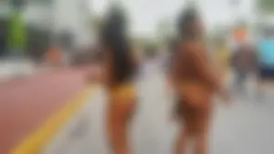 Two sexy ass black girls in thongs posing for the camera