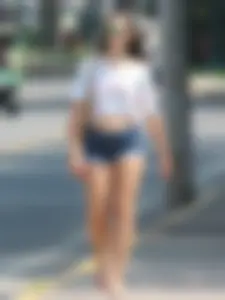 Denim short babe with a wedgie showing some cheeks