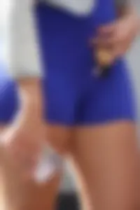Mixed race woman in spandex shorts outfit