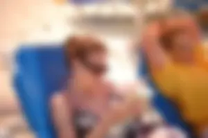 Assortment of sexy babes at the beach in bikinis