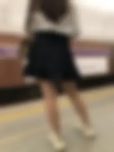 Girl in a Blouse And a Skirt With Great Legs Creepshots Gallery - Standing on the Subway Station, then Sitting With Crossed Legs in a Train