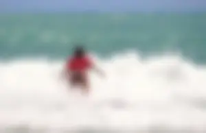 Candid surfers in bikinis