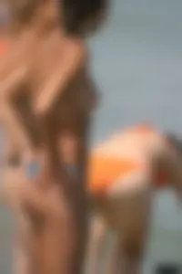 Sexy candid topless and nude beach girls