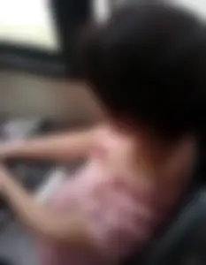 Downblouse attempt on the bus showing a girls cleavage