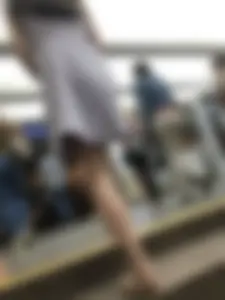 Girl in a Dress and Sandals Subway Closeups Photos of Legs