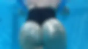 Mature Mexican lady in a swimsuit with a huge ass