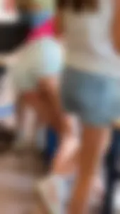 Amazing college teen in jean mini shorts bending over desk