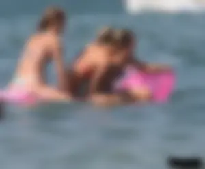 A bunch of sexy beach voyeur babes in bikinis, thongs and topless
