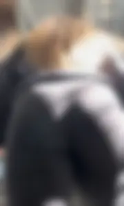 Cute College Girl With Flared Leggings And Glasses