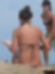 Sexy beach lady in tiny brown thong bikini with a nice ass