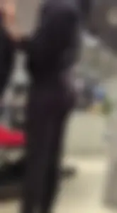 Skinny sports store employee in yoga pants