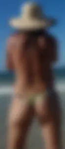 Cute girl on the beach with a decent body in thong bikini