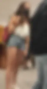 Teen with sexy legs in short jean shorts
