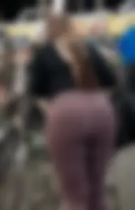 Chubby girl in leggings buying groceries